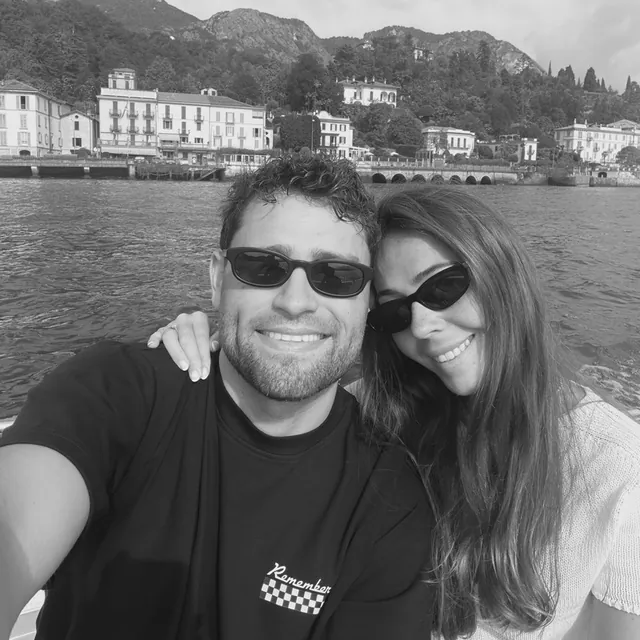 Julie and Jake on a boat on the lake